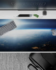 Moody navy and icy blue desk pad 40x20 inches with soft sunrise glow, calm dreamy atmosphere.