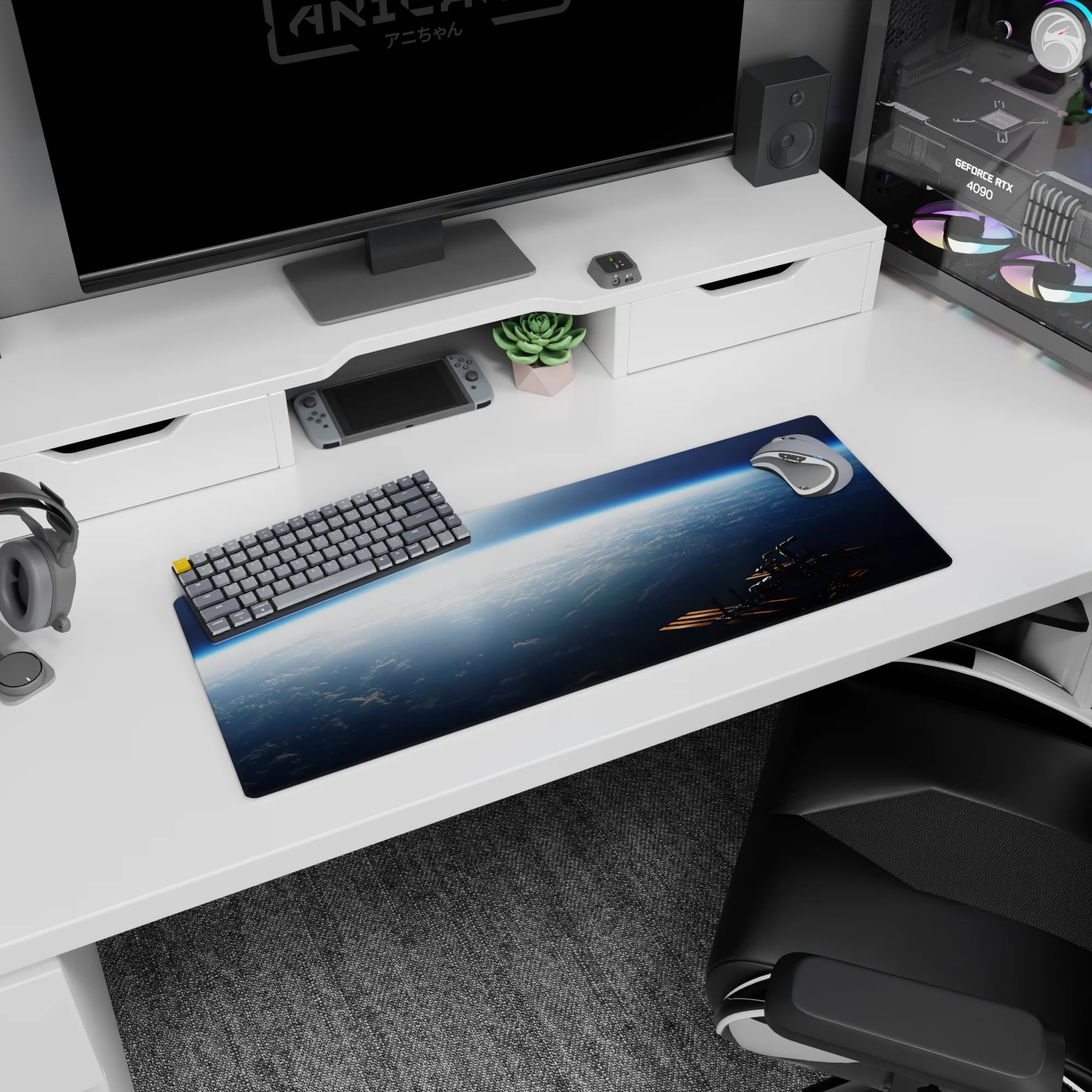 Above-the-clouds sunrise sky scene mouse pad, 32x12 inches, with tiny corner space station.