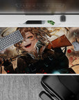 Anime girl desk pad 40x20 inches in stormy grays and smoky browns, with warm gold hair glow and red specks.
