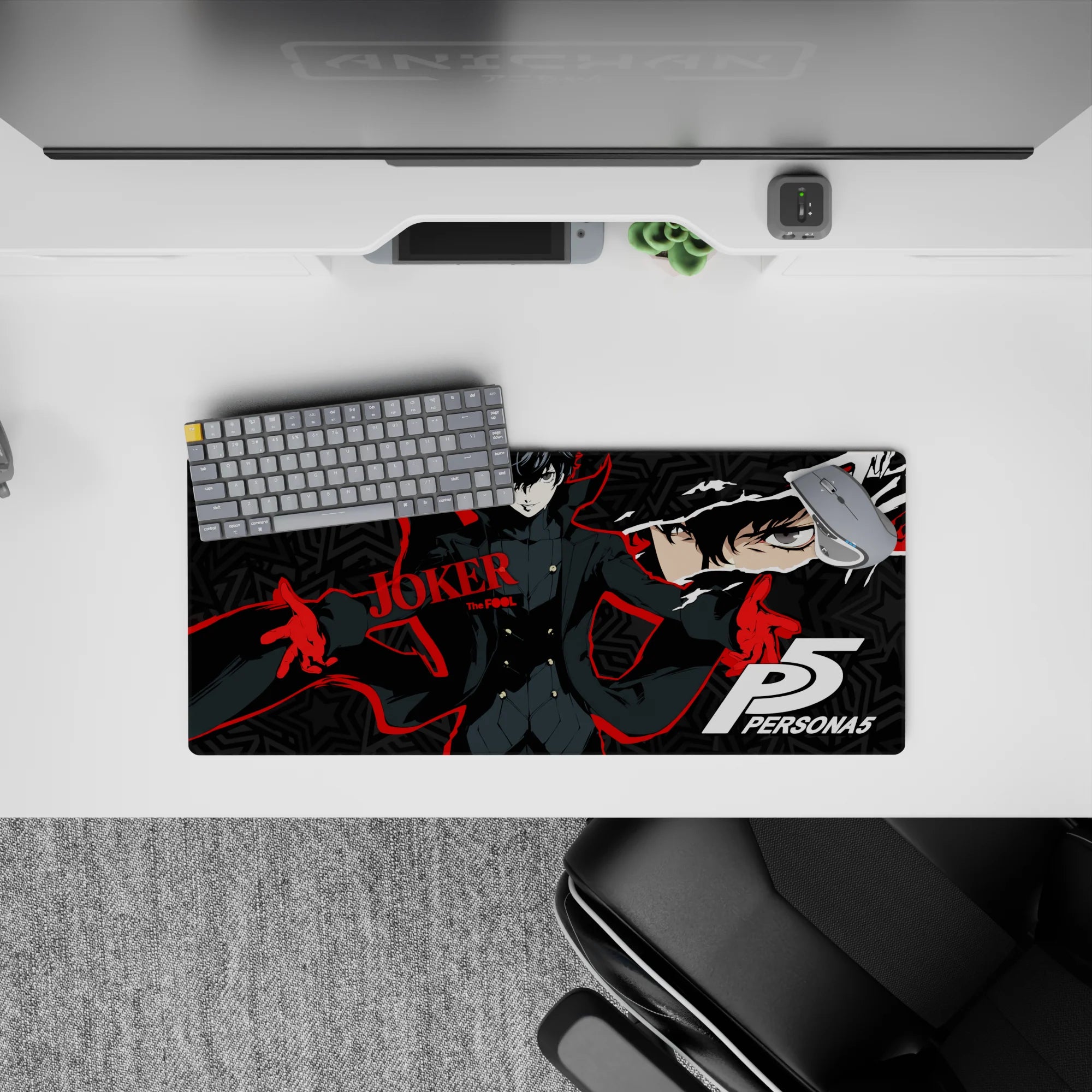 Joker anime mouse pad, 28x12 inches, featuring deep blacks, red streaks, and geometric stars for stylish rebels.