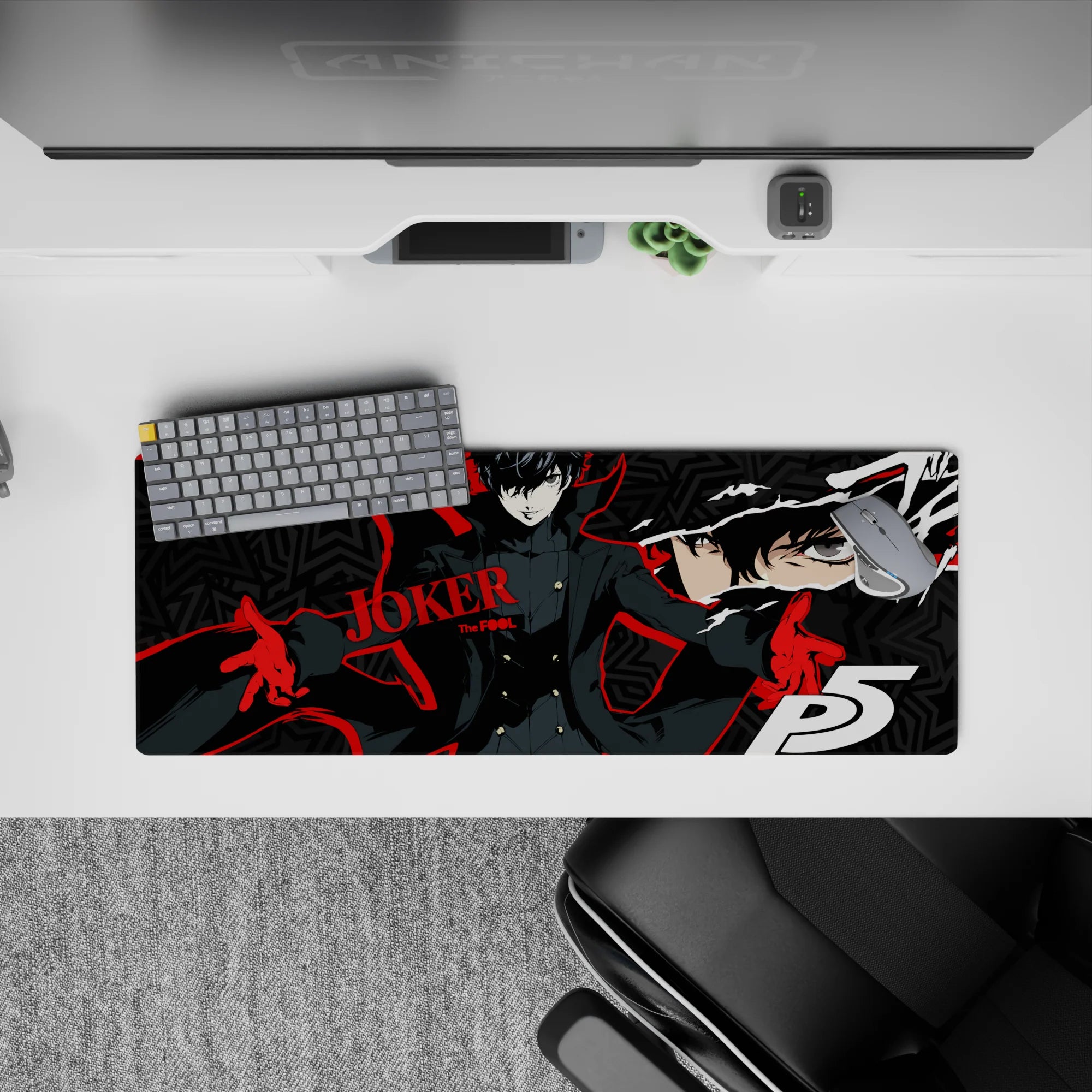 Anime mouse pad featuring Joker from Persona 5, size 32x12 inches, showcasing bold red and black design with geometric stars.