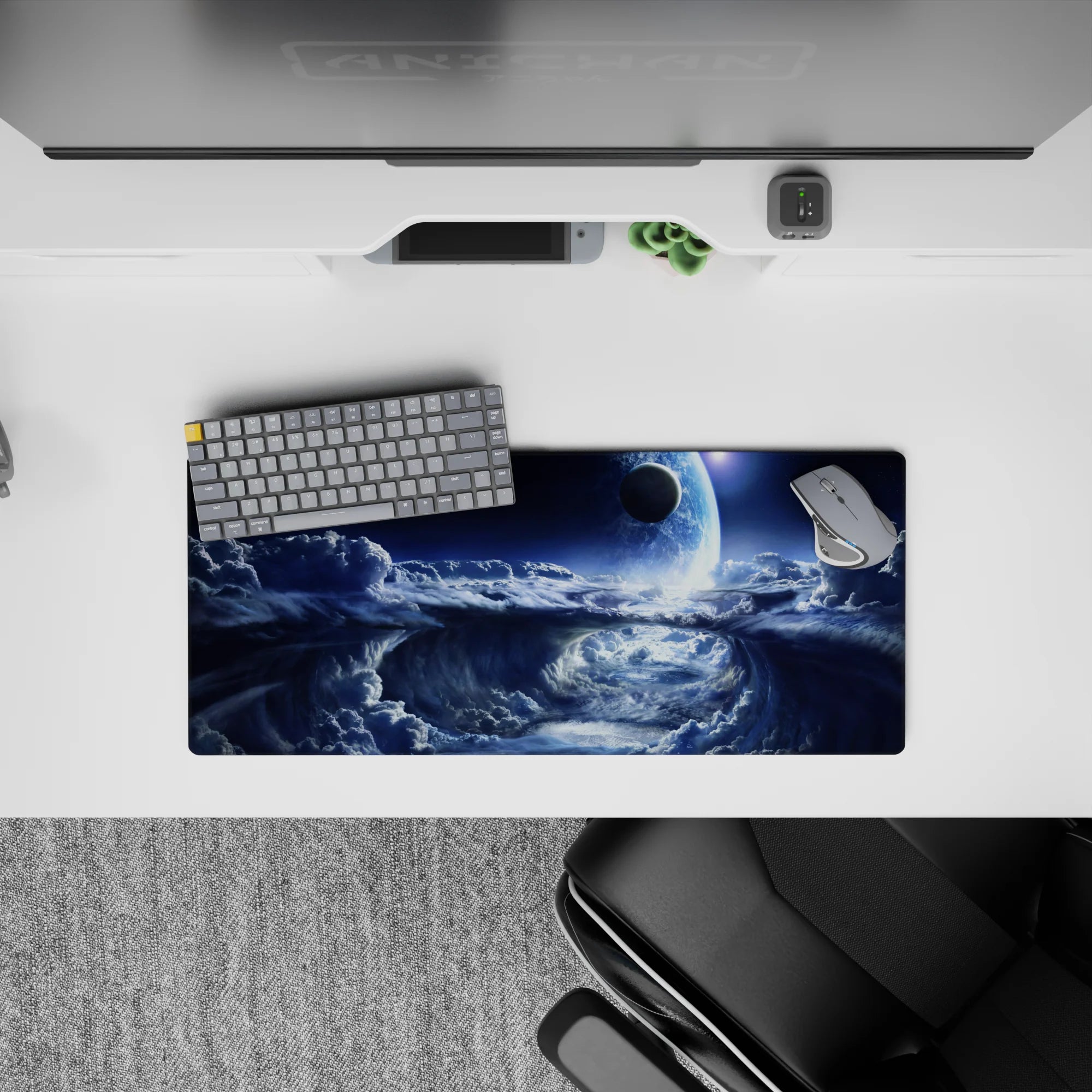 Cool blue to deep navy cosmic calm mouse pad with silver mist edges, 28x12 inches.