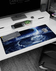 Glowing planet above swirling storm clouds desk pad, space sky scene, 36x16 inches.