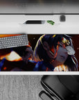 Anime girl desk pad 36x16 inches in warm orange glow and deep shadows, fiery late-night action mood.