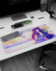 36x16 inches anime desk pad showing violet-haired girl and uniformed boy holding hands in a quiet kiss.