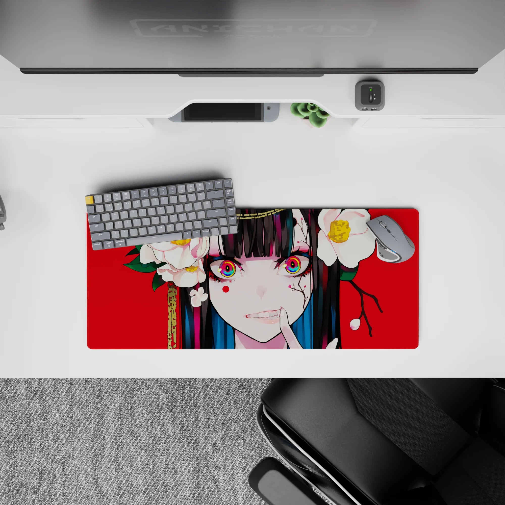 28x12 inches desk mat in bold red with white camellia blooms, glossy black hair, teal streaks, edgy cute.