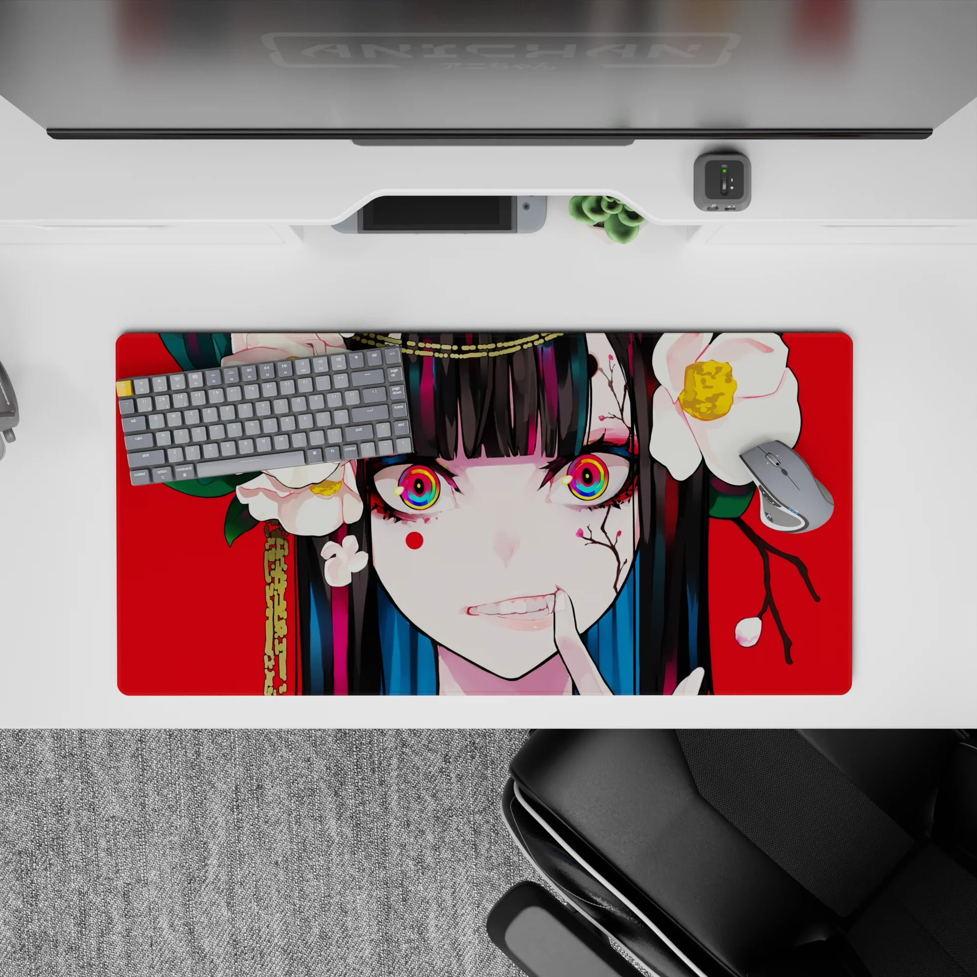 Anime girl mouse pad 32x16 inches, vivid red and white florals with rainbow eyes for playful menace mood.