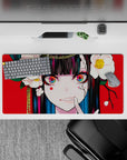 Anime girl mouse pad 32x16 inches, vivid red and white florals with rainbow eyes for playful menace mood.