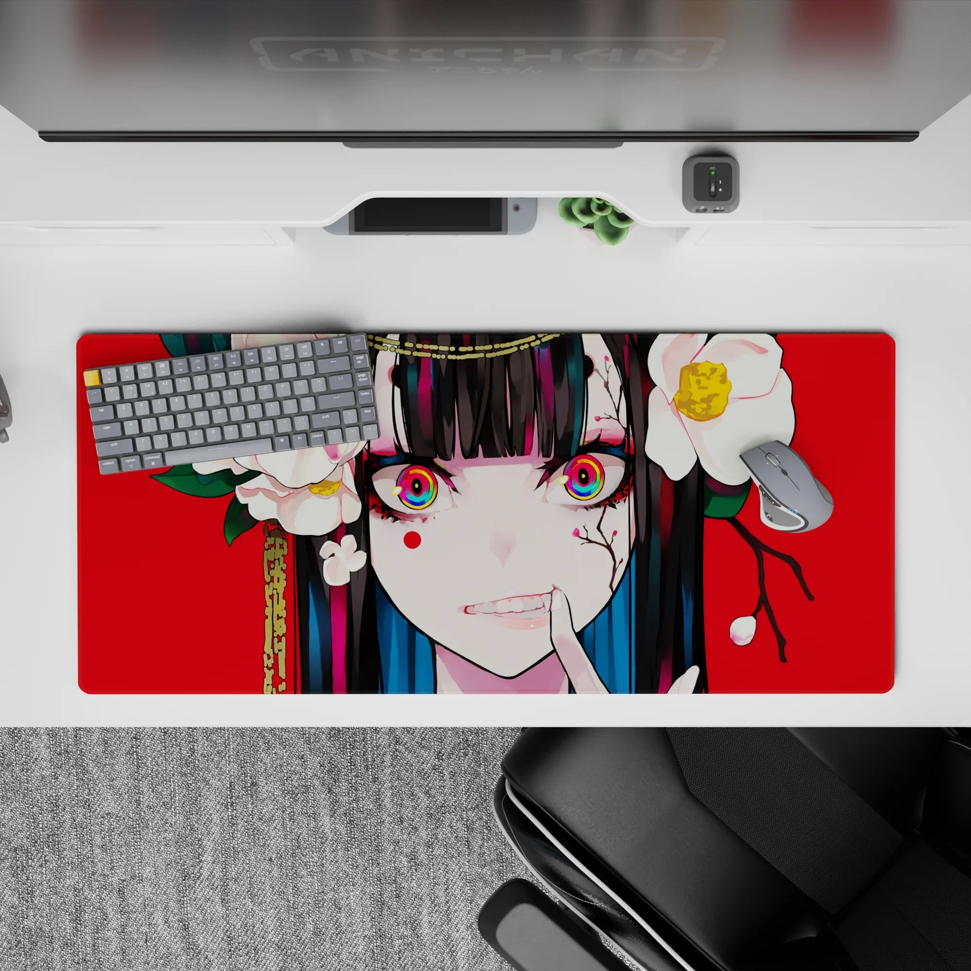 36x16 inches desk mat in bold red with crisp white flowers, teal hair streaks, and playful chaotic vibe.
