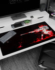 Anime sharpshooter girl in sniper pose desk pad 40x20 inches, white silhouette over red splatter.