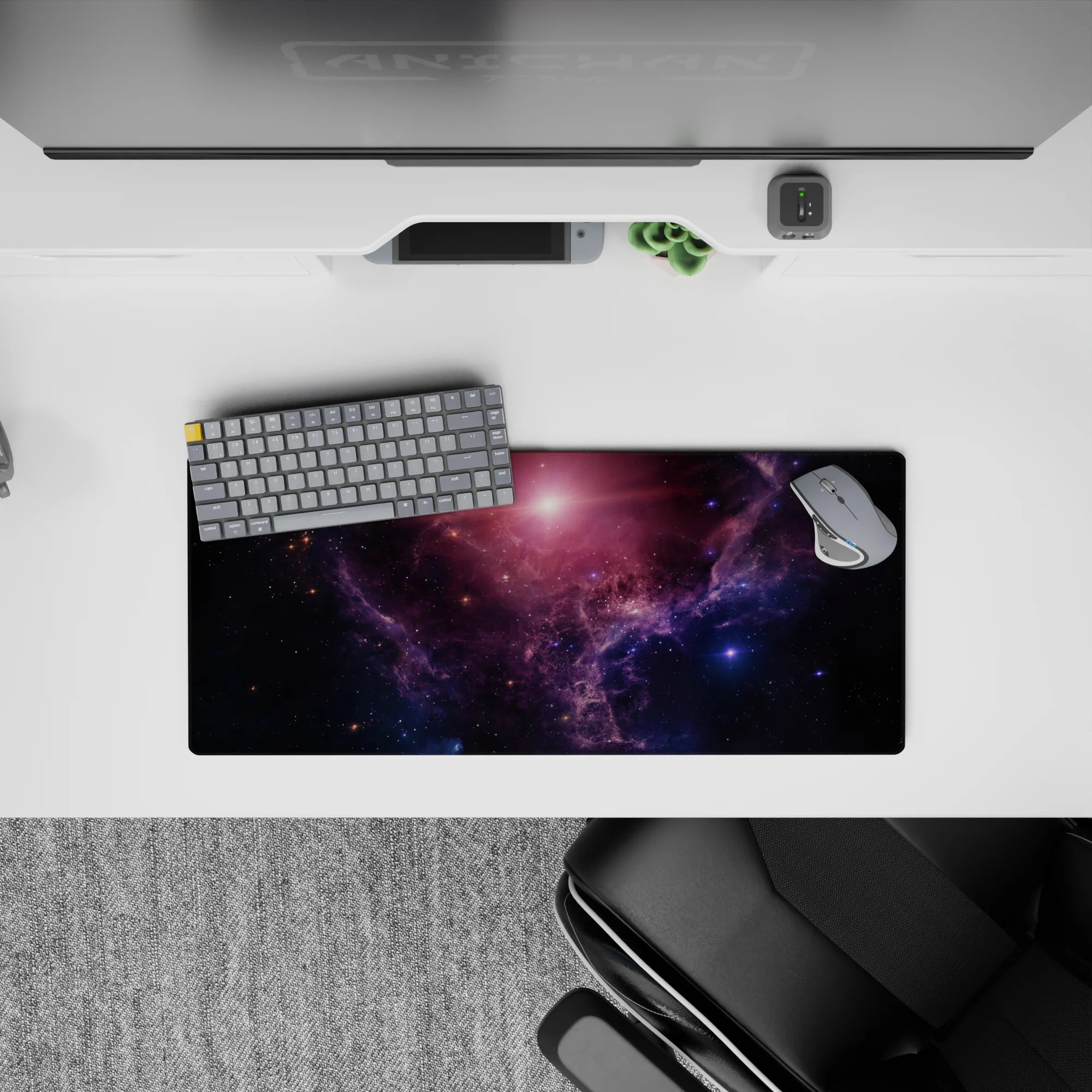 Deep navy and violet haze mouse pad, 28x12 inches, with soft pink sunrise glow and calm cosmic mood.