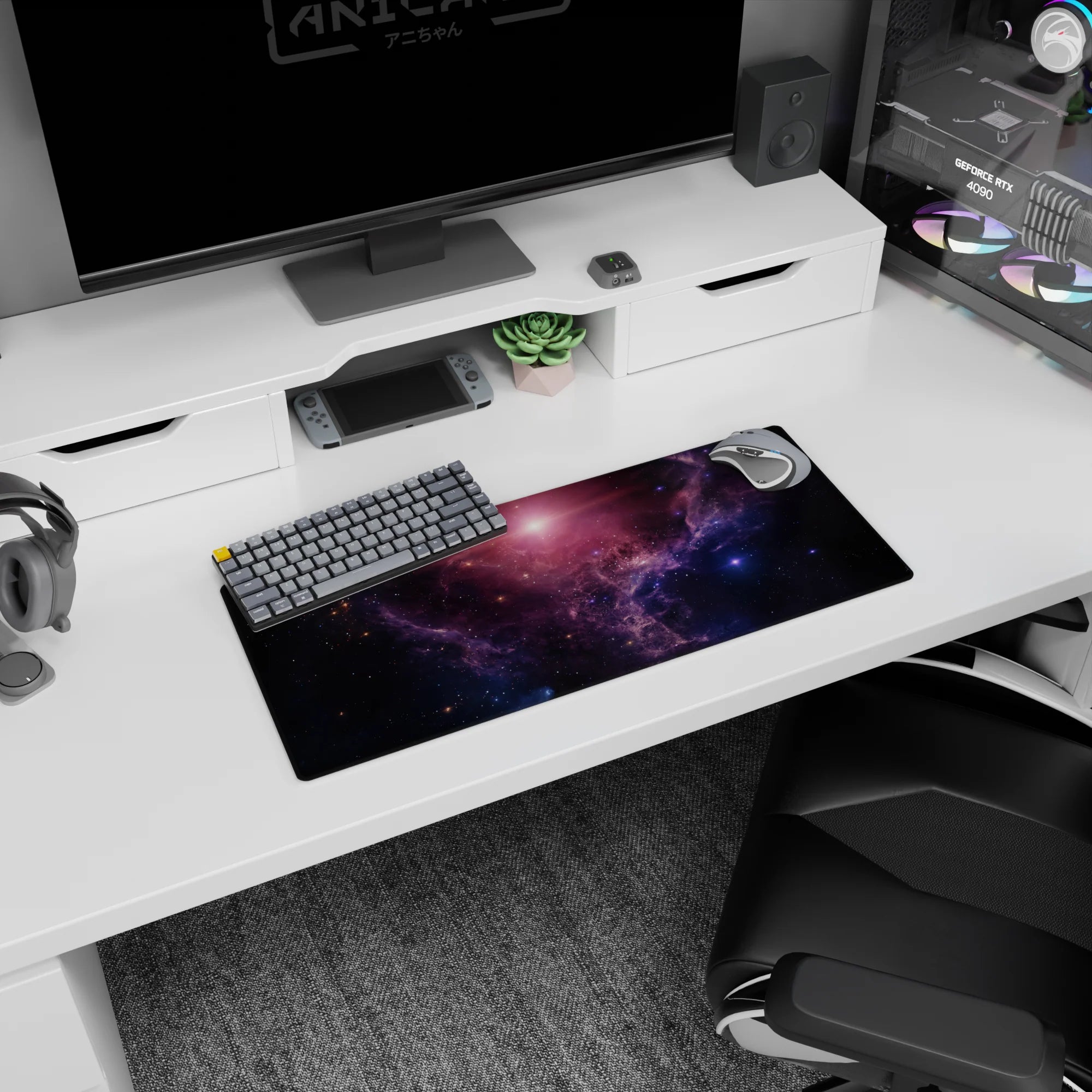 Starry space scene mouse pad, 28x12 inches, featuring swirling nebula clouds and tiny specks of light.