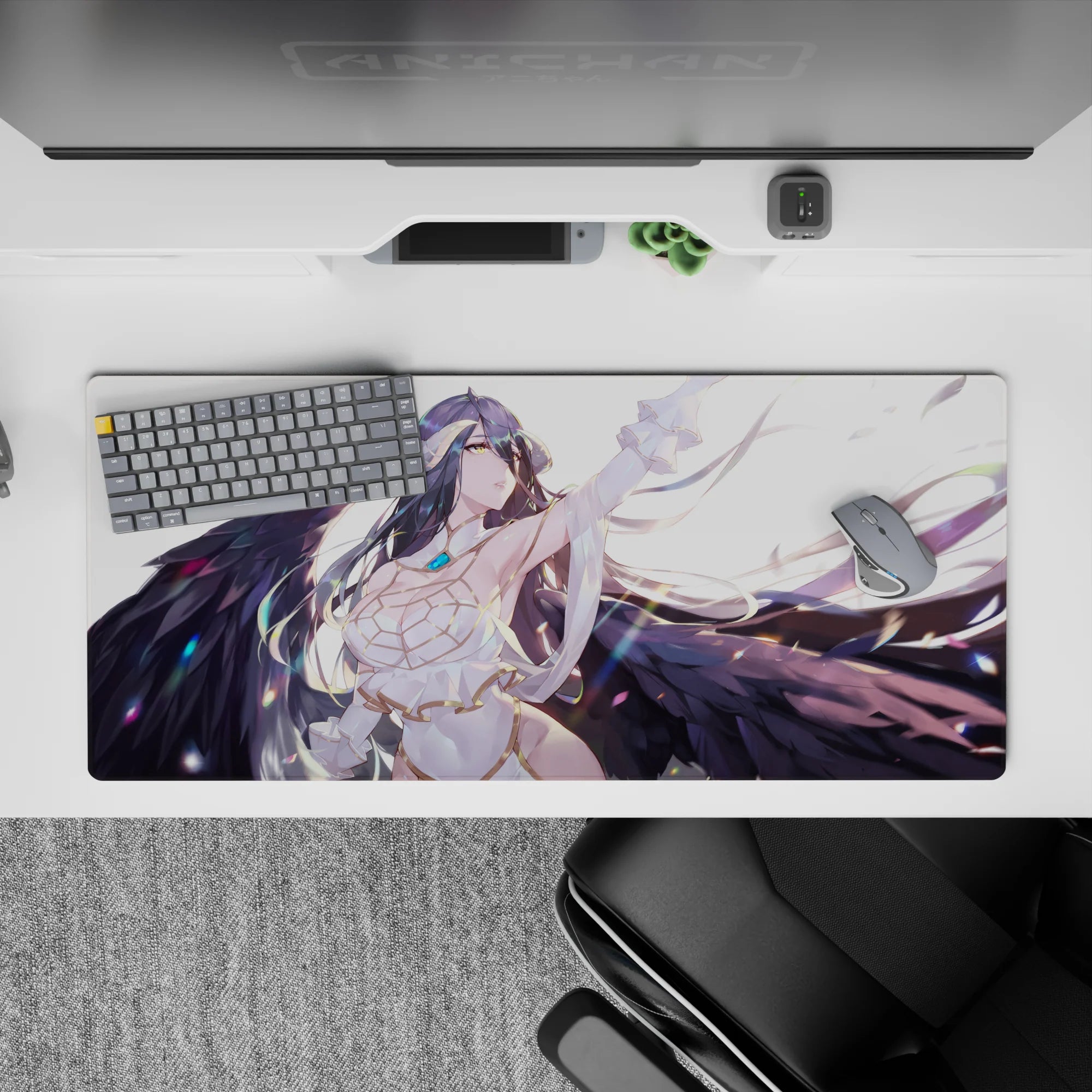 Albedo from Overlord on a 36x16 inch anime desk pad, showcasing her fierce and serene look with wings and floating feathers.