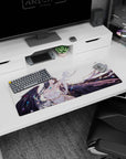 Albedo from Overlord anime on a 32x12 inch mouse pad, showcasing her fierce yet serene look with flowing hair and wings.