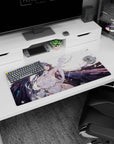 Albedo from Overlord on a 32x16 inch mouse pad, showcasing her fierce yet serene look with flowing hair and wings against a feathered background.