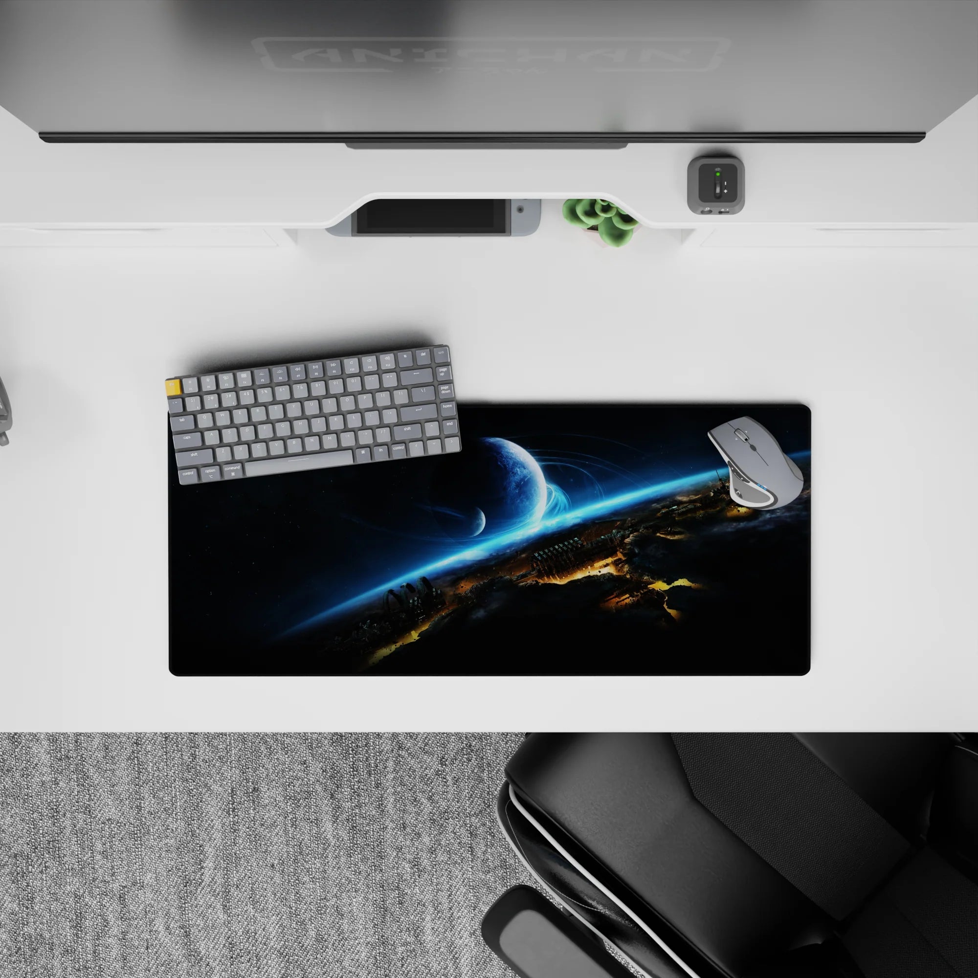 Cool sci-fi desk pad 28x12 inches in inky black, smoky gray, and electric cyan for a calm space vibe.