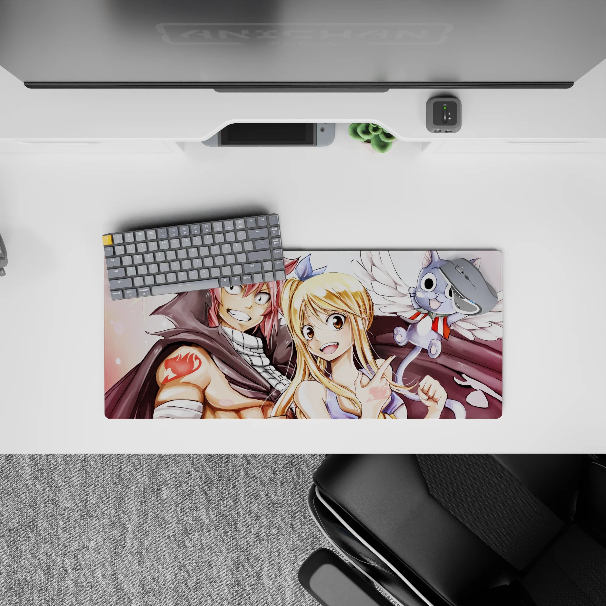 Warm rosy and gold tones on an anime mouse pad 28x12 inches, bright guild mark detail and soft shadows.