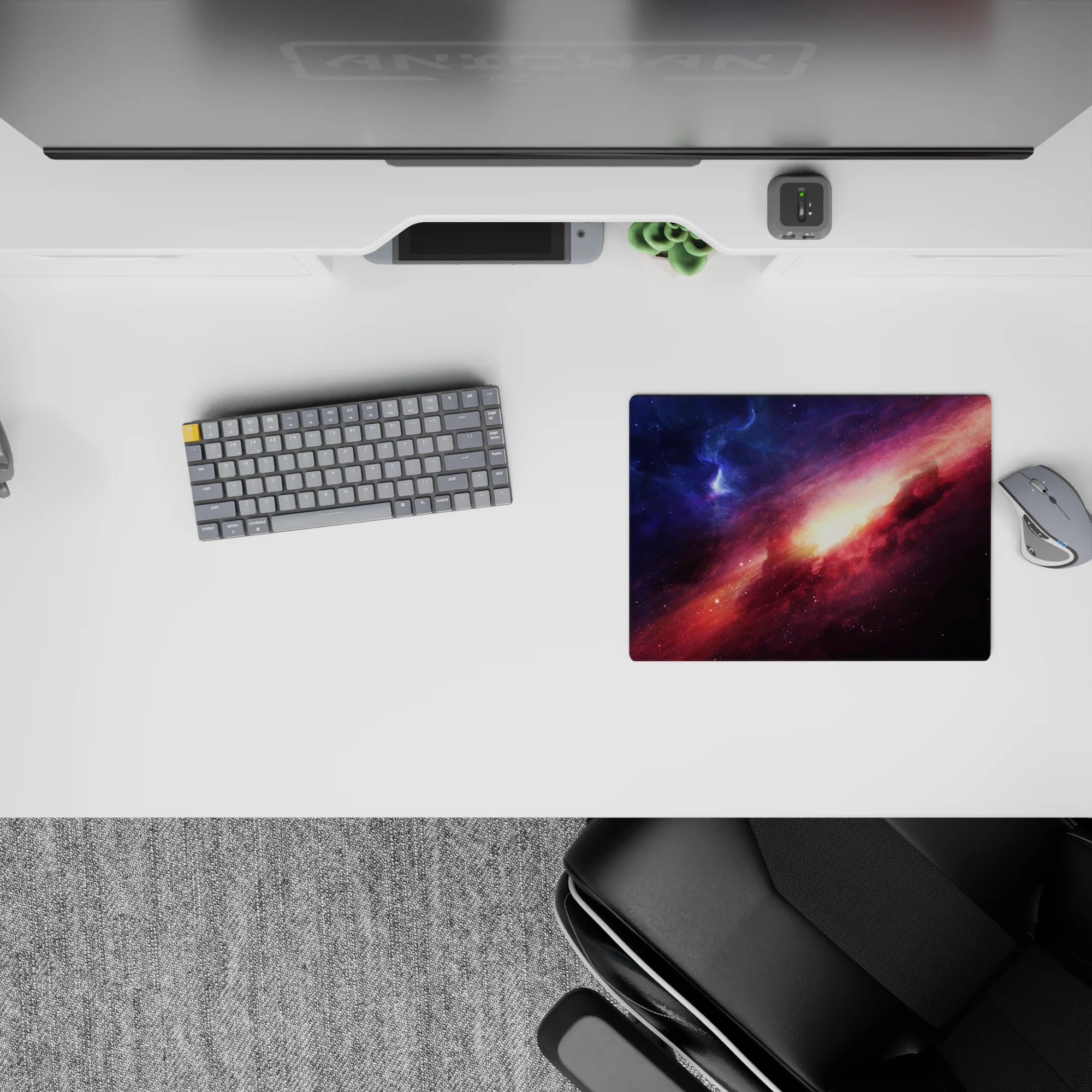 Cosmic 14x10 inches mouse pad in midnight blue, rosy magenta clouds, and a warm golden glow.