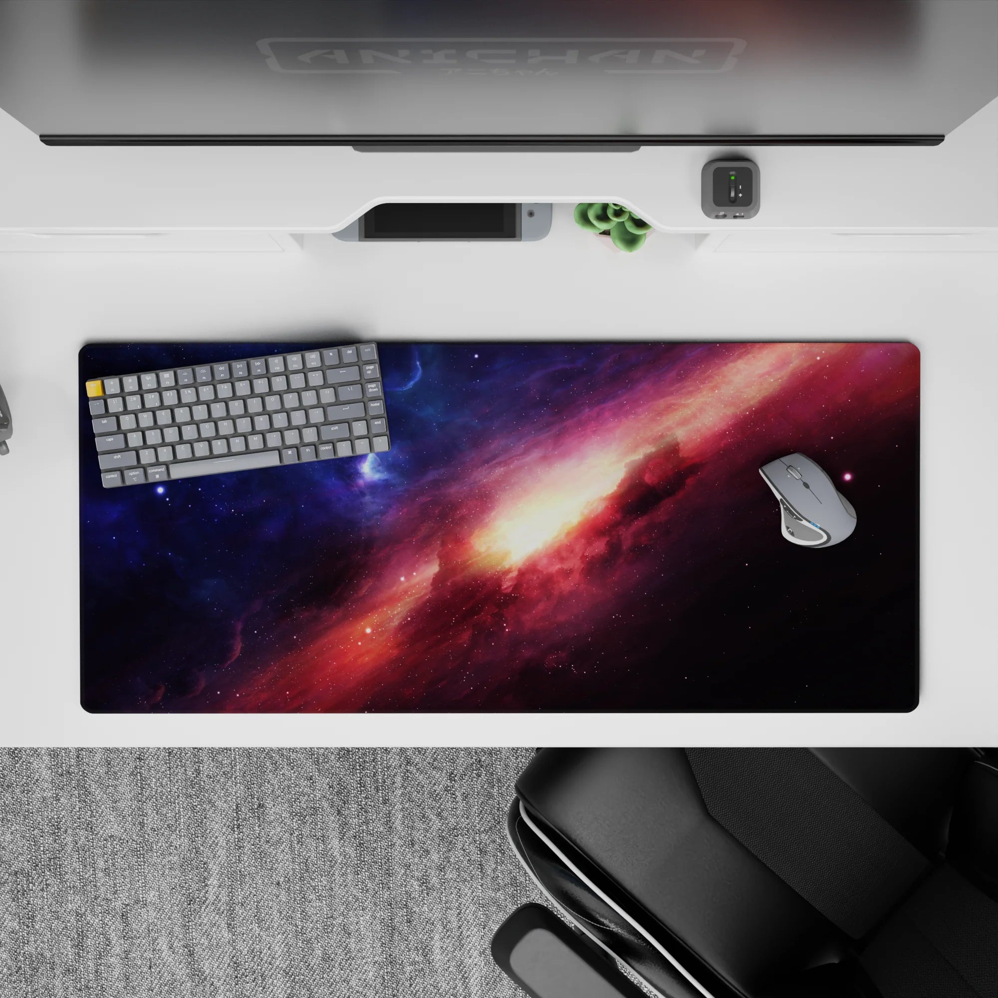 Midnight blue and rosy magenta desk pad, 36x16 inches, calm cosmic mood with warm sunrise glow.