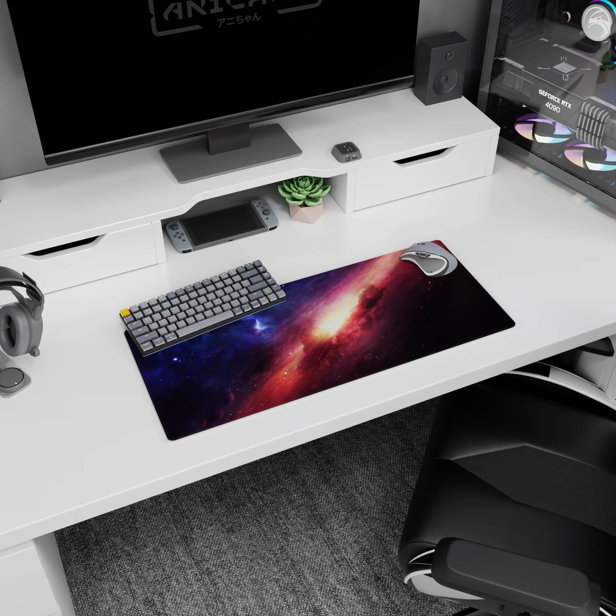 Space scene mouse pad 28x12 inches featuring a sweeping nebula streak across a star-speckled night sky.