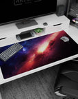 Space cloud desk pad 40x20 inches featuring a bright golden core sunrise amid drifting nebula.