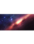 Galaxy nebula desk pad, 36x16 inches, with star-speckled clouds and a glowing golden core.