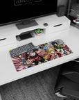 Natsu grinning with goggles and pink scarf beside Lucy in a red chair on an anime mouse pad 28x12 inches.