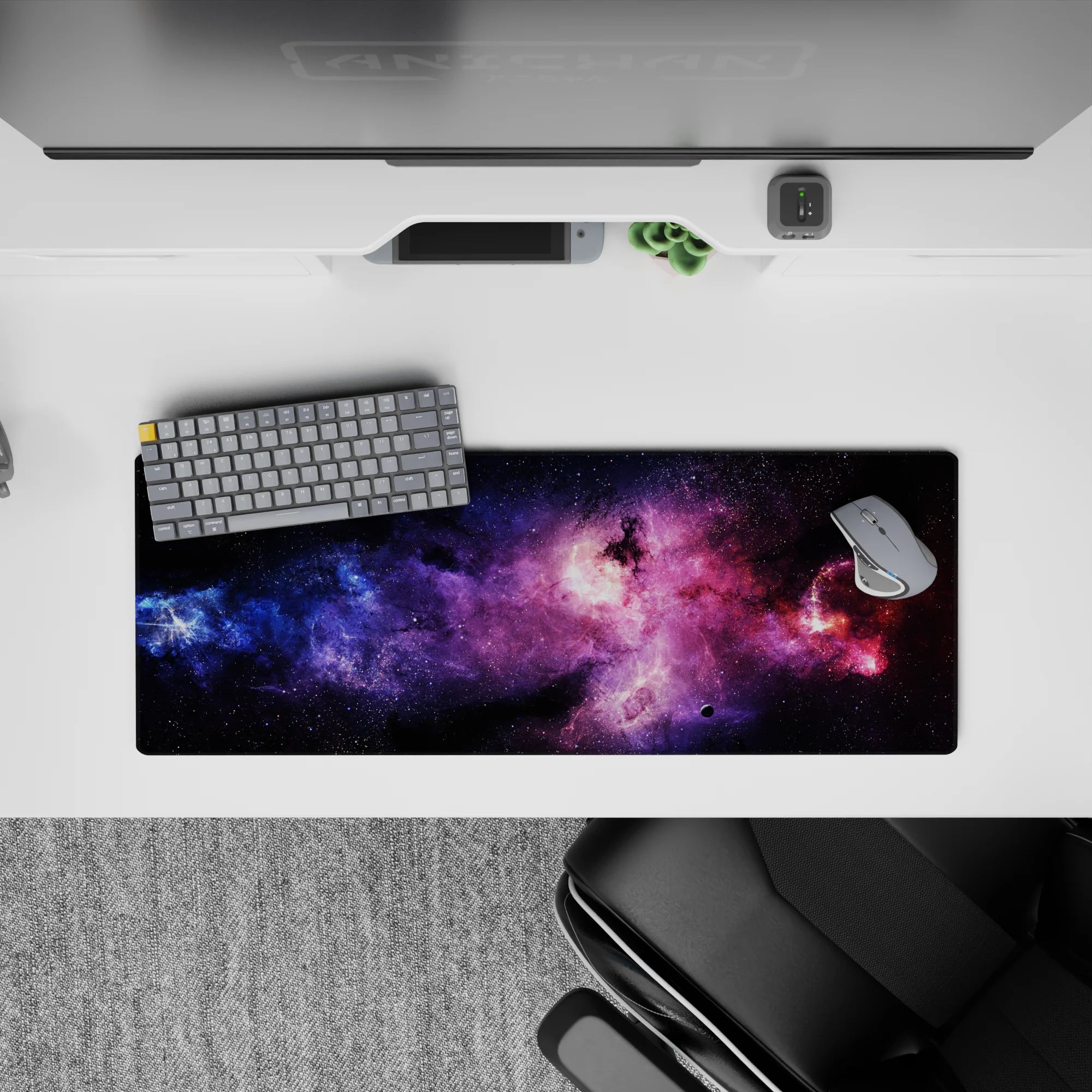 Dark space mouse pad 32x12 inches in violet haze with electric blue and magenta glow, late-night vibe.
