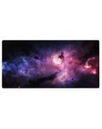 Nebula galaxy desk mouse pad 32x16 inches with swirling clouds and star-speckled cosmic pattern.