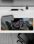 Chaotic-cute anime desk mat 32x12 inches in smoky gray-blue with warm sparks and amber glow.