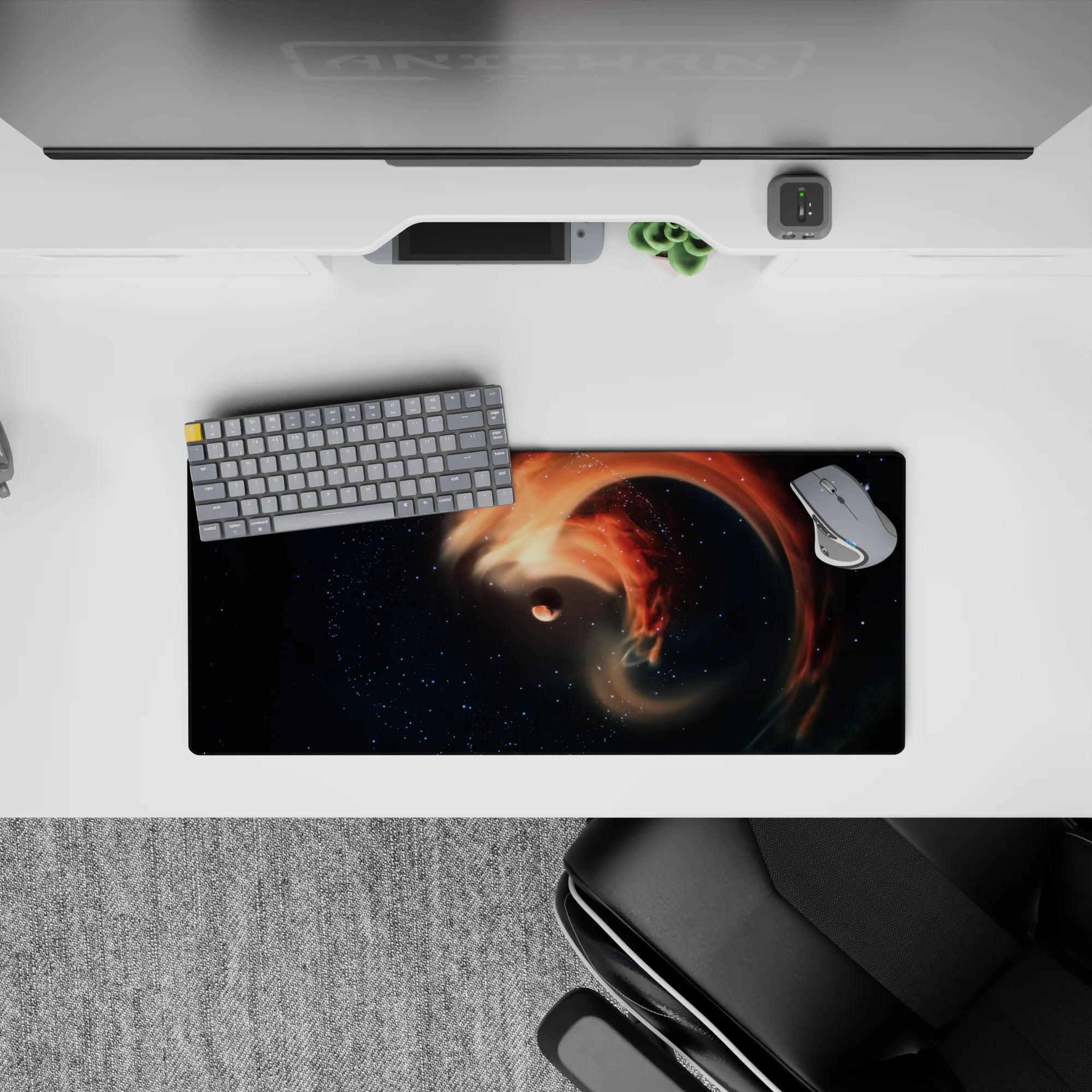 Calm dreamy desk mat mouse pad 28x12 inches in smoky black and starry navy with warm orange accents.