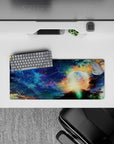 Deep blue to teal mist mouse pad 28x12 inches with warm gold clouds for a cozy, calming late-night vibe.