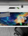 Deep blue to teal desk pad 36x16 inches with warm gold clouds, cozy calming night-sky mood.