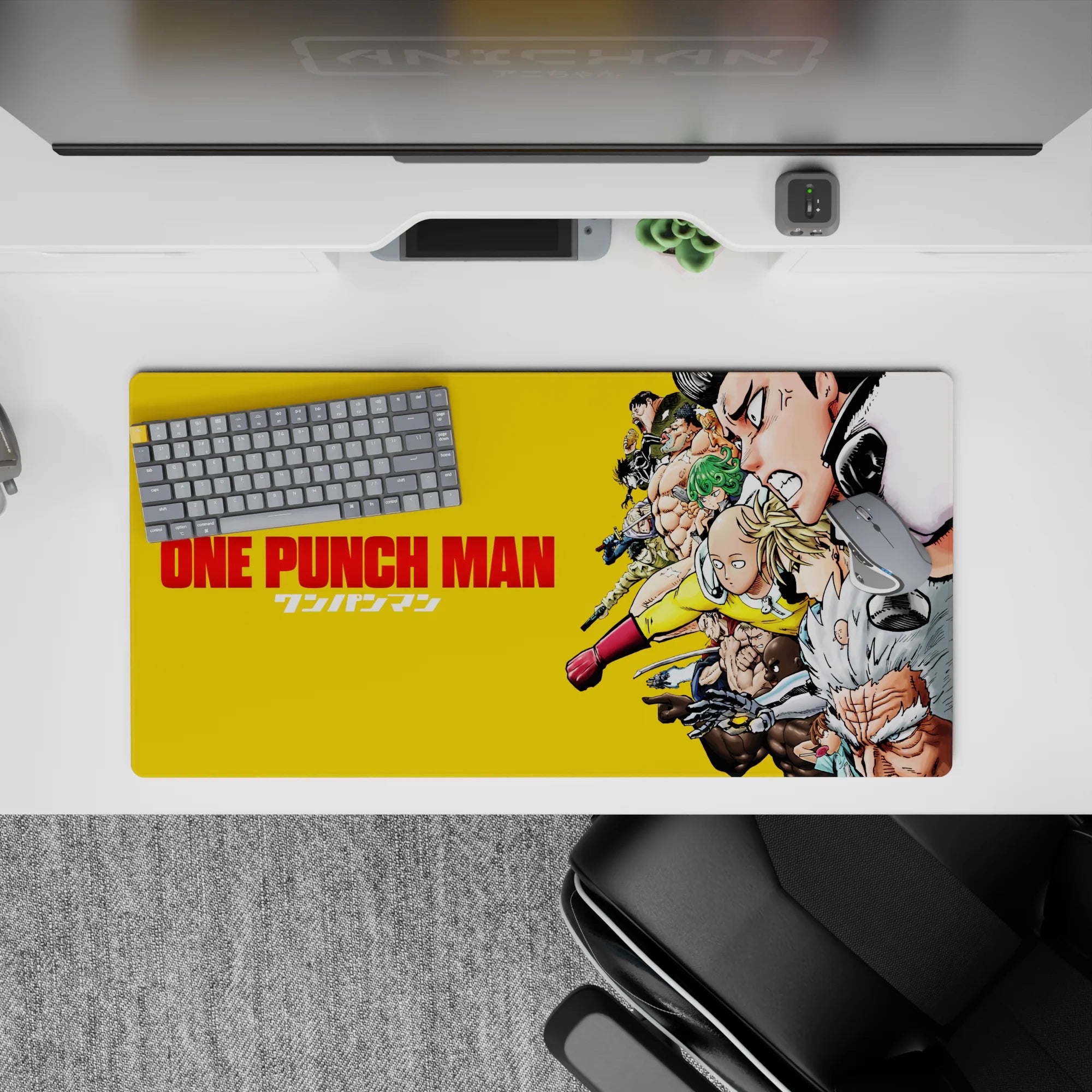 Bold yellow One Punch Man desk mat 32x16 inches, crisp high-contrast art that feels loud and motivating.