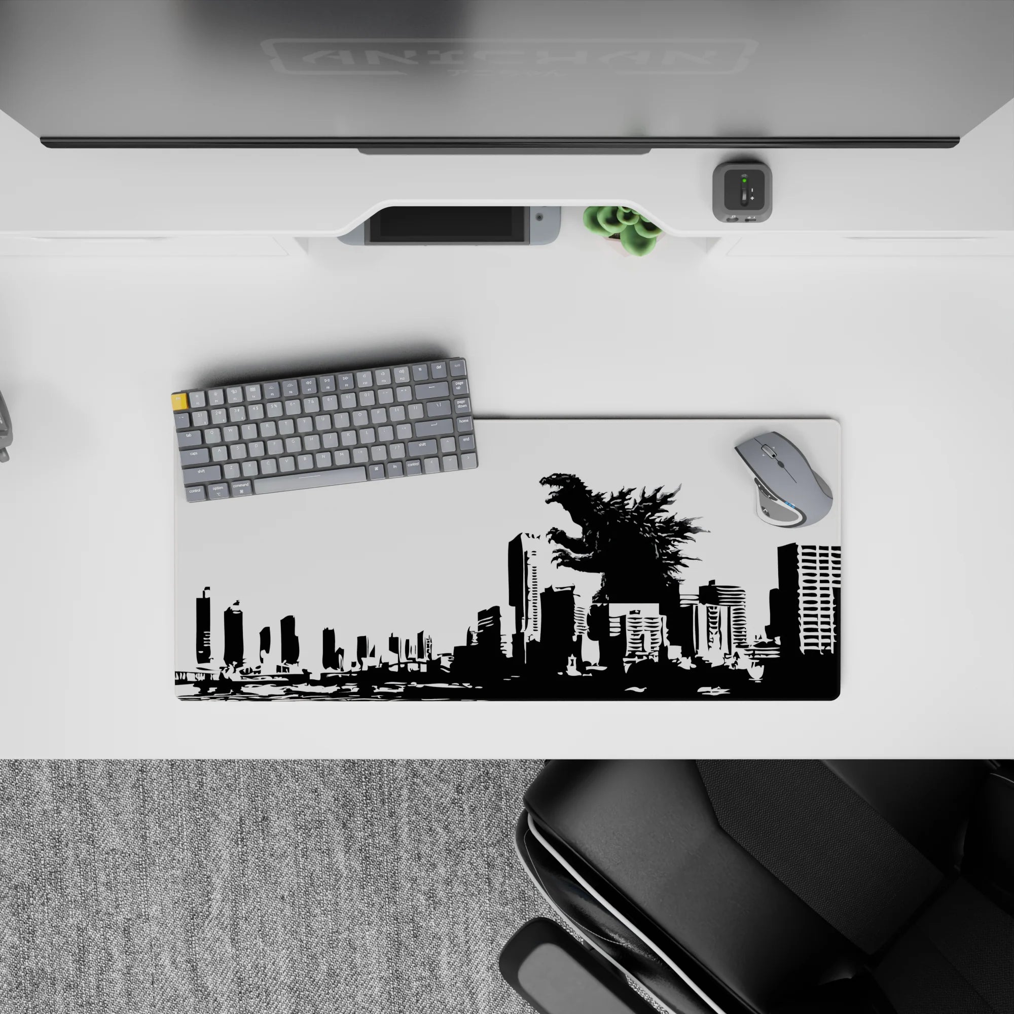 28x12 inches anime mouse pad in stark black and white, high-contrast, cinematic kaiju attack mood.