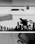 High-contrast black-and-white anime desk pad 36x16 inches with cinematic kaiju poster mood.