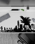 High-contrast black and white 40x20 inches anime desk pad, cinematic city terror mood with ink-splash spines.