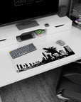 28x12 inches anime mouse pad showing roaring kaiju with ink-splash spines towering over stacked buildings.