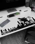 Roaring kaiju looming over stacked city buildings on a 40x20 inches anime desk pad, bold graphic scene.