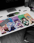 Cocoa, Chino, Rize, Chiya and Syaro lined up with bows and winks desk pad, 40x20 inches.