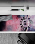 Rosy nebula and smoky violet gradient desk pad with calm sci-fi mood, 36x16 inches.