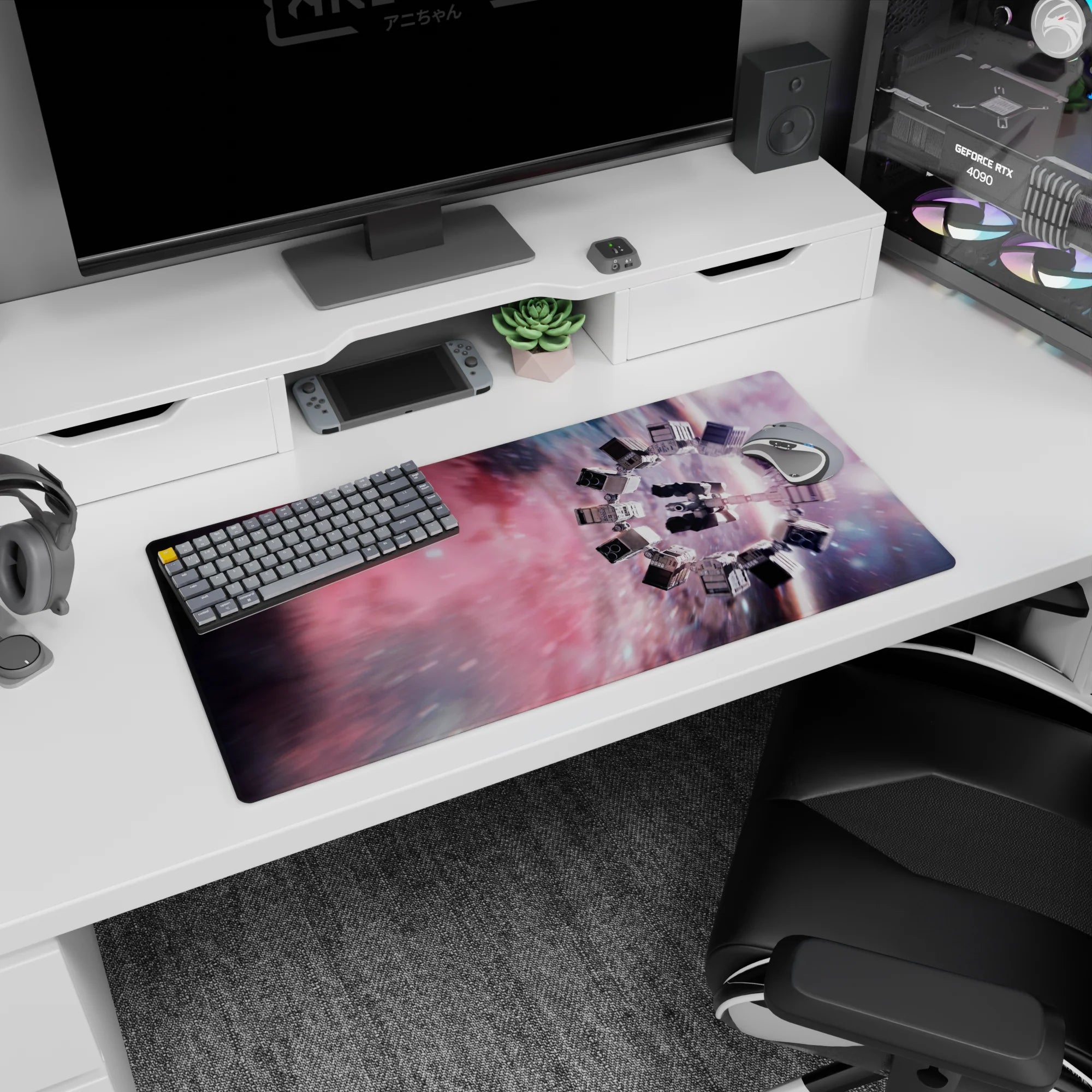 Spinning spacecraft in a star-streaked galaxy mouse pad, 32x16 inches, deep space scene.