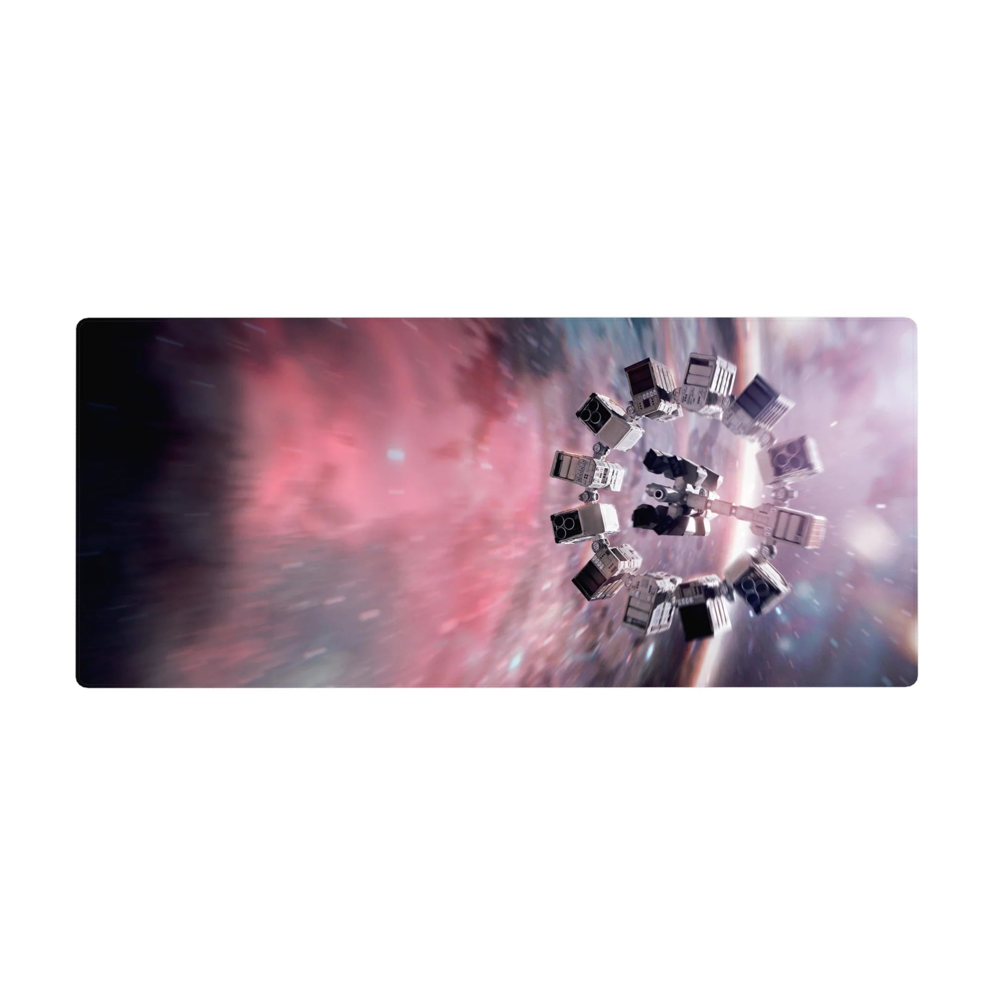 Cosmic nebula desk pad with swirling galaxy blur and streaky stars, 36x16 inches.