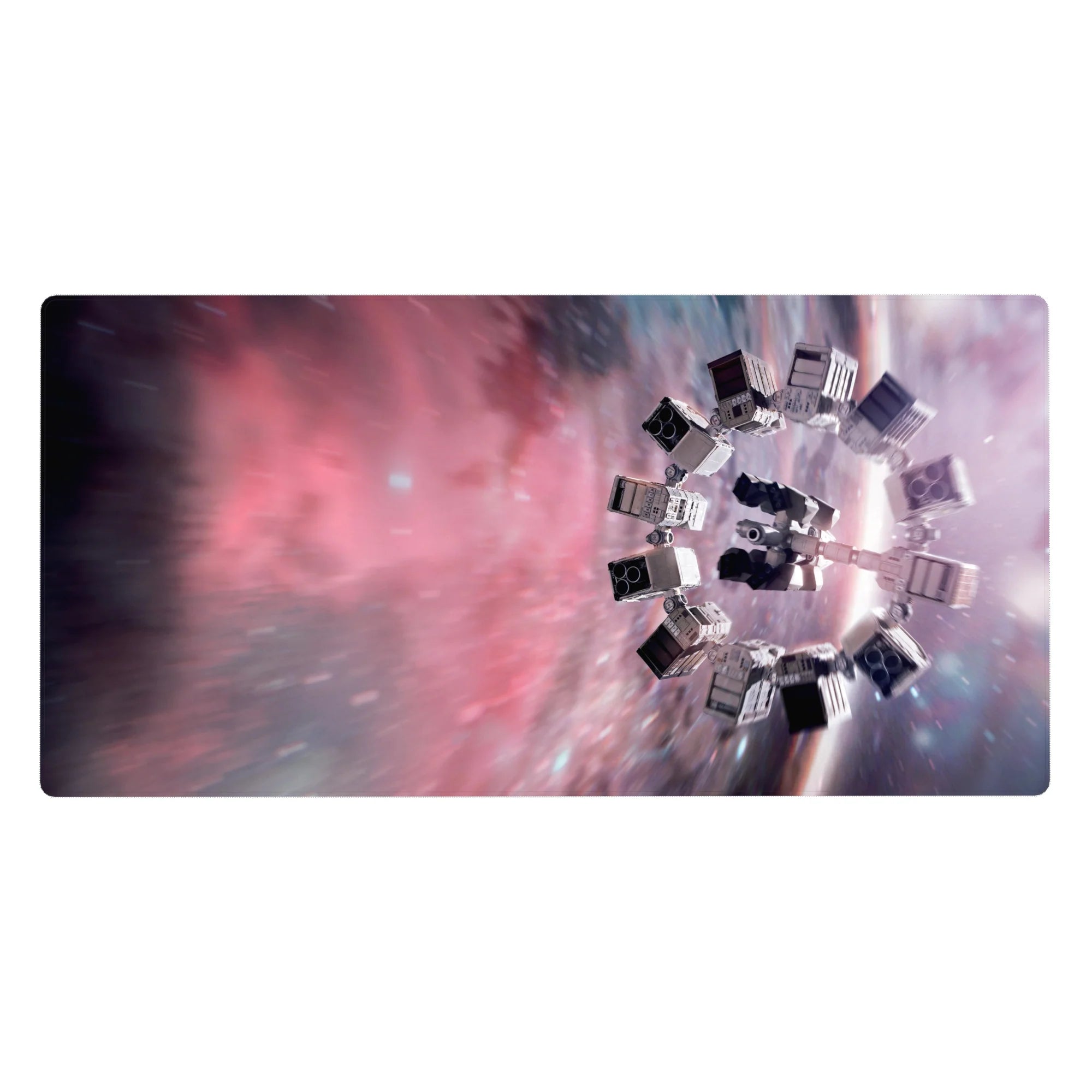 Cosmic nebula desk pad mouse pad, 40x20 inches, with swirling space backdrop and streaky stars.