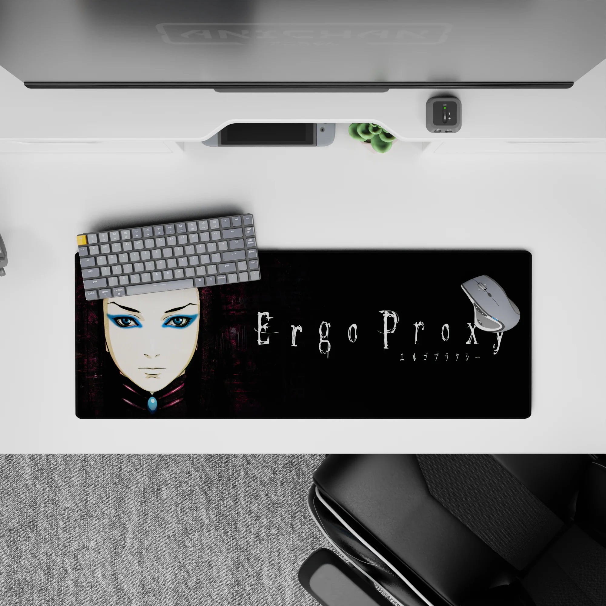 32x12 inches desk pad in moody inky black with worn purple tones, sharp eyeliner, and blue eyeshadow.