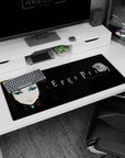 36x16 inches Ergo Proxy desk pad showing Re-L Mayer staring forward with sharp eyeliner on rainy alley wall.