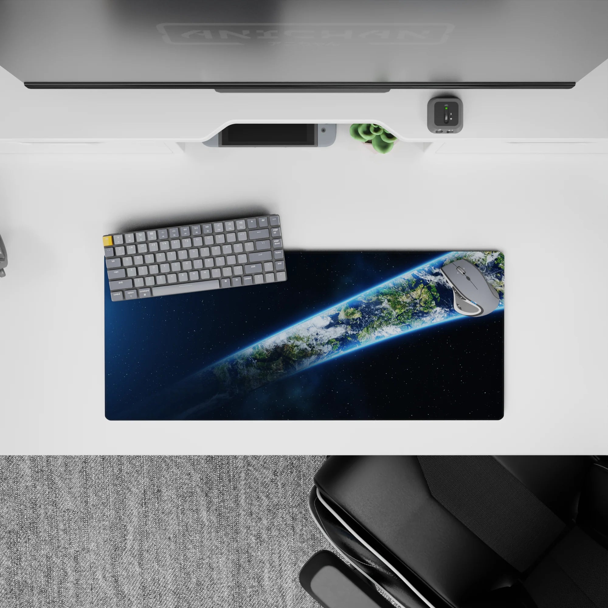Midnight blue space mouse pad 28x12 inches with calm neon glow edge and subtle starry speckles.
