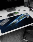 Earth slicing a bright tilted ribbon through space desk pad 40x20 inches with crisp clouds and stars.