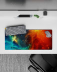 Dreamy bold 28x12 inches mouse pad in teal and ocean blue fading into fiery orange and deep red.