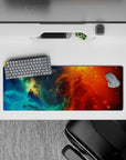 Dreamy teal and ocean blue fade into fiery orange and deep red, 32x12 inches mouse pad.